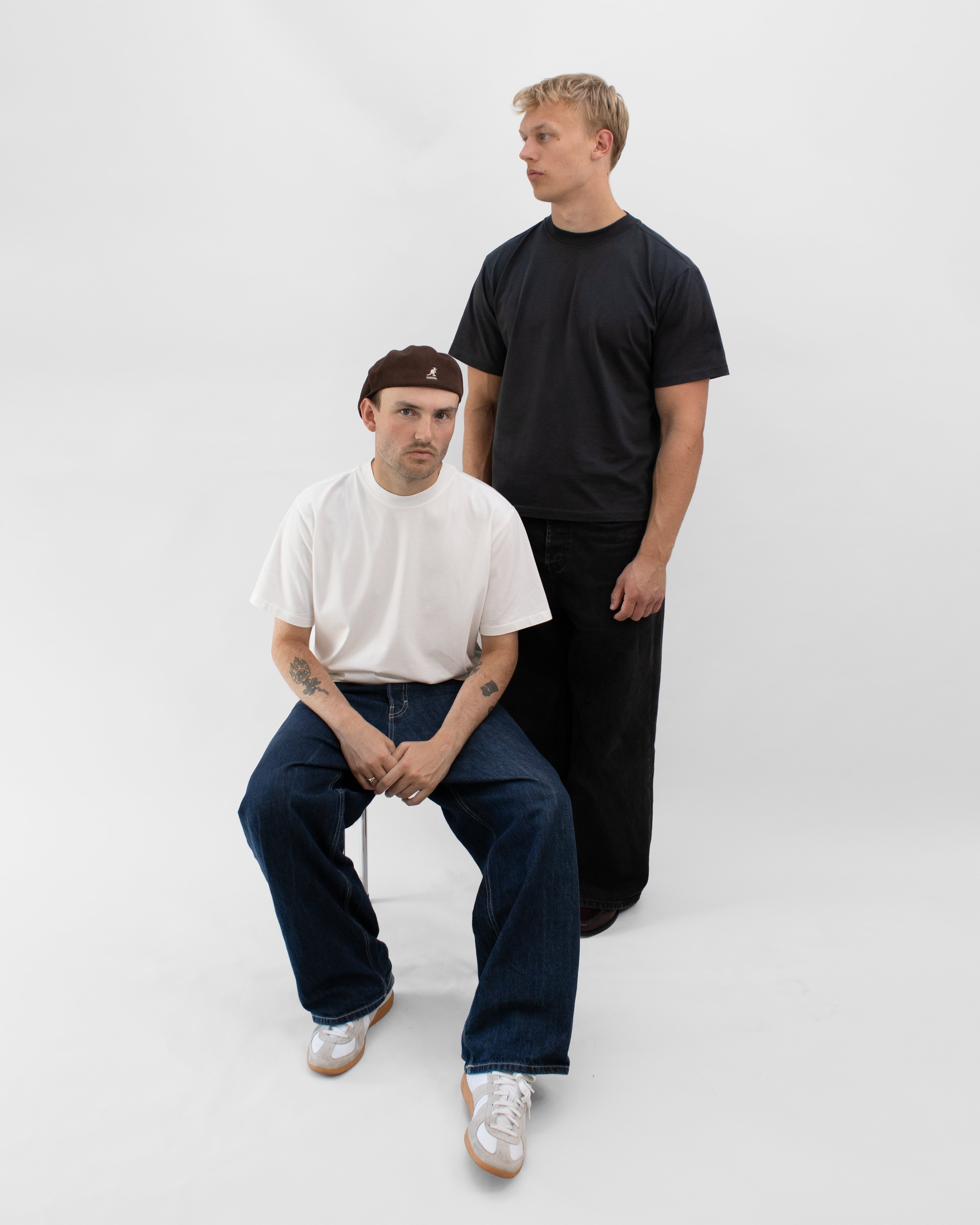 Two models wearing Braddyll oversized t-shirts in black and white 200 GSM cotton